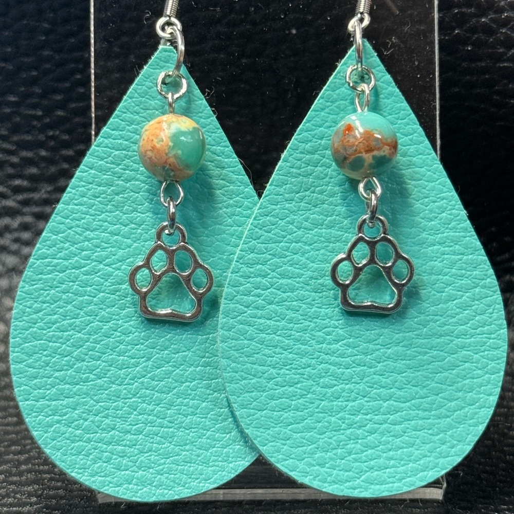Handmade teal faux leather earrings with paw prints